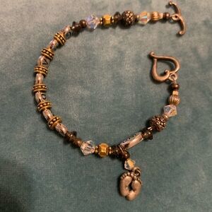 Elegant Beaded Bracelet for Grandma.Love & Silvertone baby feet charm